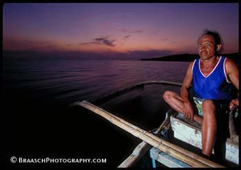 People. Reef fisher, returning at dusk. Bataan, Philippines. Canoes. Night. Assignment