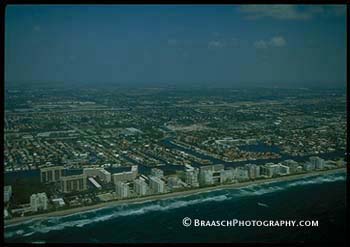 Miami. Florida coast. Atlantic ocean. Urban development. Urban areas. Sprawl. Retirement. Aerial. Apartments.