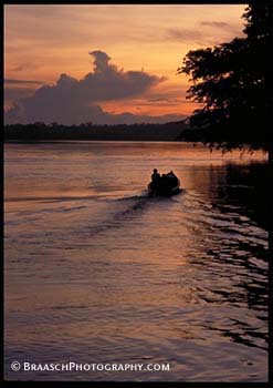 Amazon River. Peru. Tropics. Canoes. Sunset. Native peoples. 