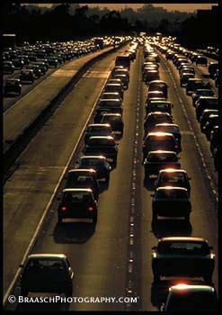 Traffic jams. Congestion. Rush hour. Cars. Freeways. Sunset. Los Angeles. Pollution. Global warming